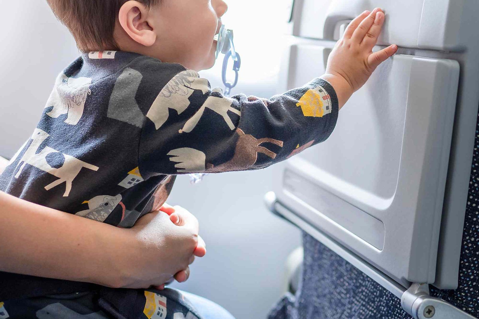 Woman Says Fellow Passenger Said She Shouldn’t Fly Business Class with an Infant