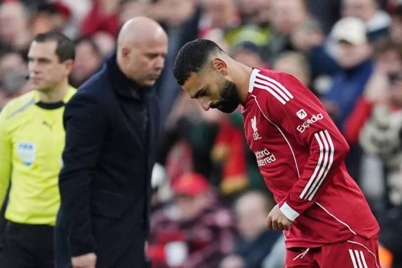 Liverpool's Mohamed Salah is substituted on and Liverpool manager Arne Slot looks on during the Premier League match at Anfield, Liverpool. Picture date: Saturday December 13, 2025.